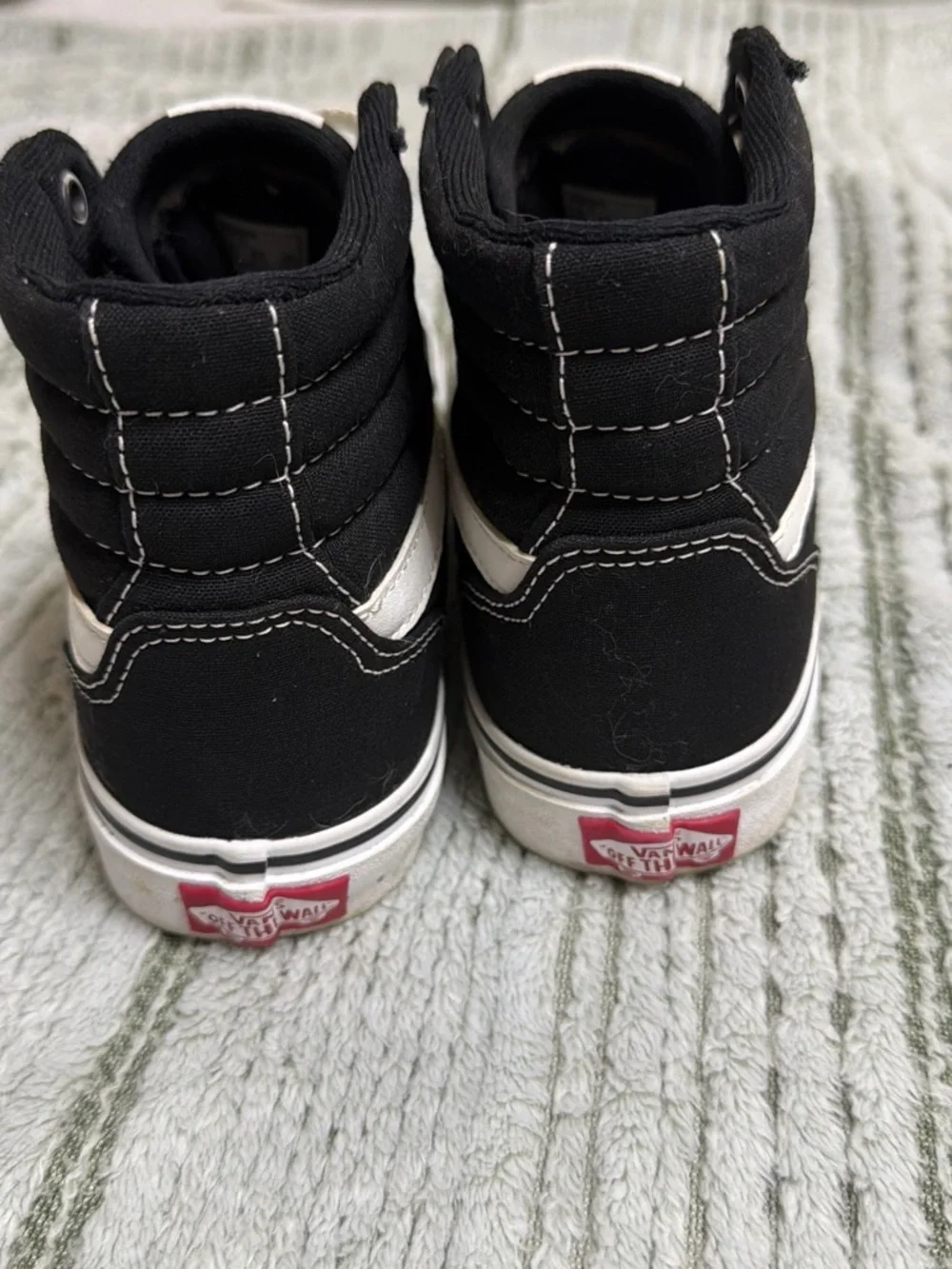 Vans Black and White High-Top Skate Sneakers